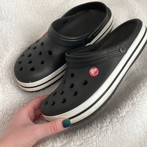 Black crocs with pizza jibbit